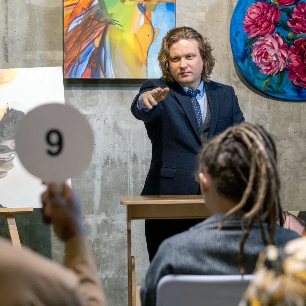 auctioneer pointing